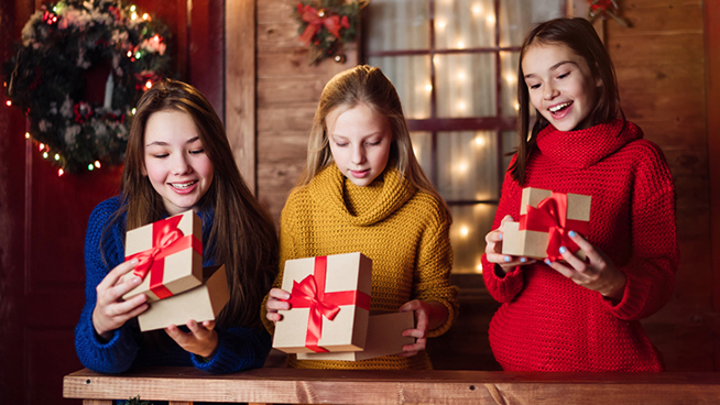Three child girl with gift boxs